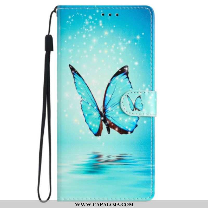 Capa De Couro Para iPhone 15 De Cordão Borboleta Azul Em Vôo Com Alça